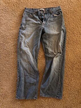 Levi's Light Blue Relaxed Fit Distressed Jeans